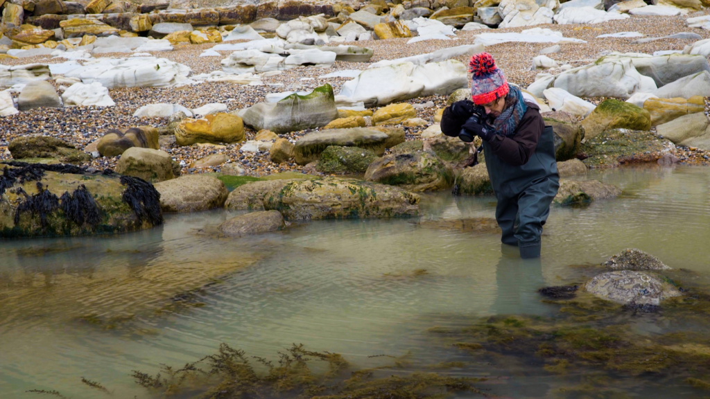 Artist photographing under the surface for the coast portfolio