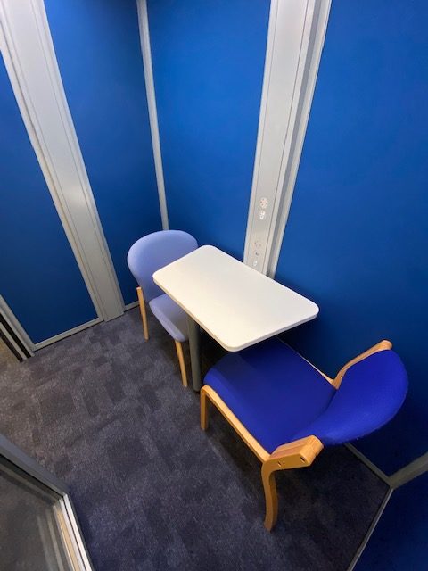 Study pod with 2 chairs and a table